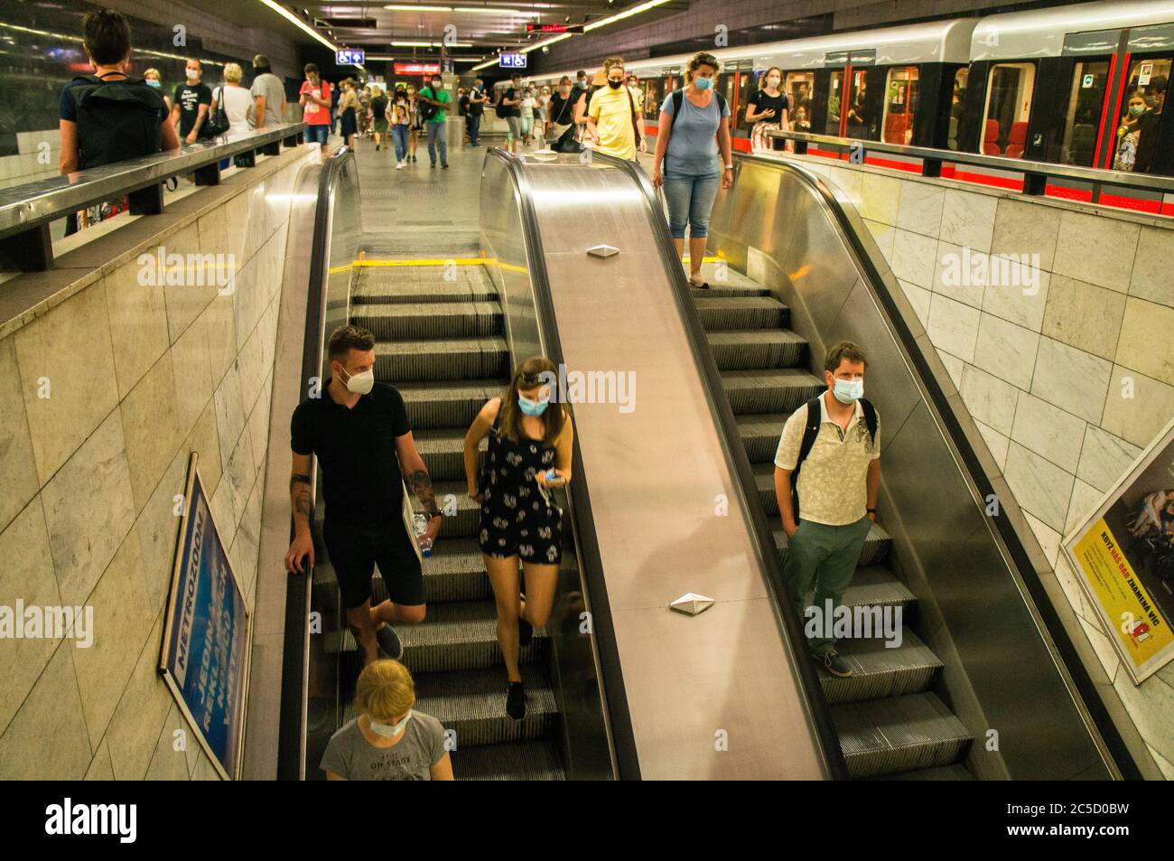 People travel in the Pague´s metro station Muzeum on Tuesday, June 30, 2020, before tomorrow`s end of mandatory wearing of face masks in public transp Stock Photo